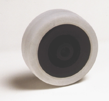 Ruote serie M Ruote per mobilio e per arredamento interni. Ruota a foro passante.<br/>Ruota con battistrada in gomma grigia antitraccia e nucleo in materiale termoplastico nero.